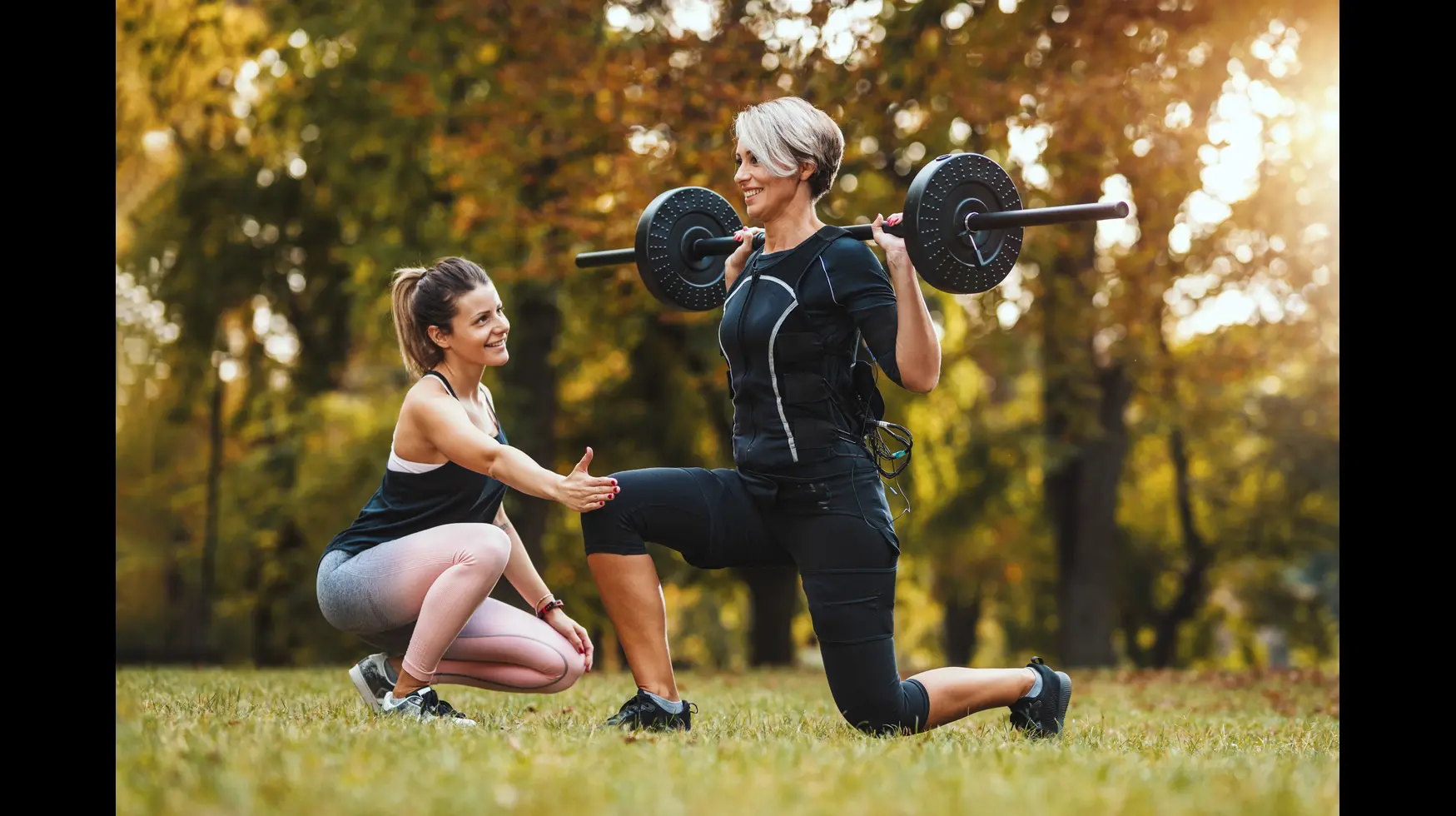Teamwork in mountains at sunrise